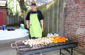 man cooking vegatables