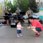 child and man in front of a band
