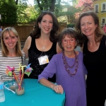 Four women smiling at the camera