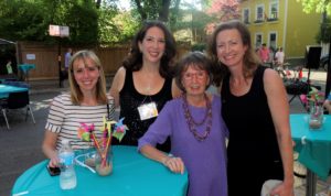 Four women smiling at the camera