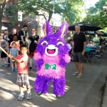 children playing with a piñata