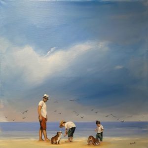 People and dogs on a beach
